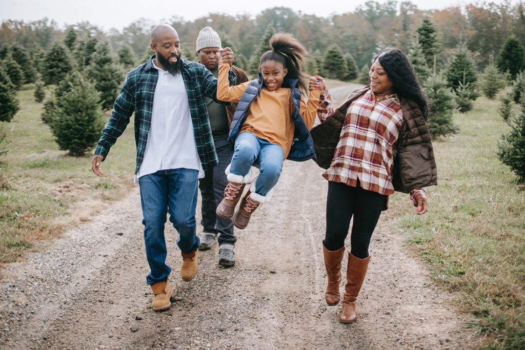 family having fun on a countryside walk