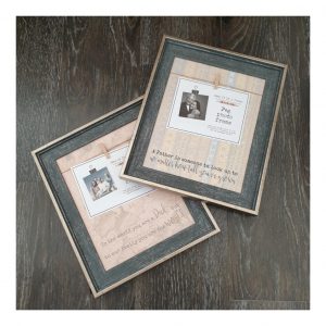 two grey photo frames with pegs to hang photos from and fathers day wording